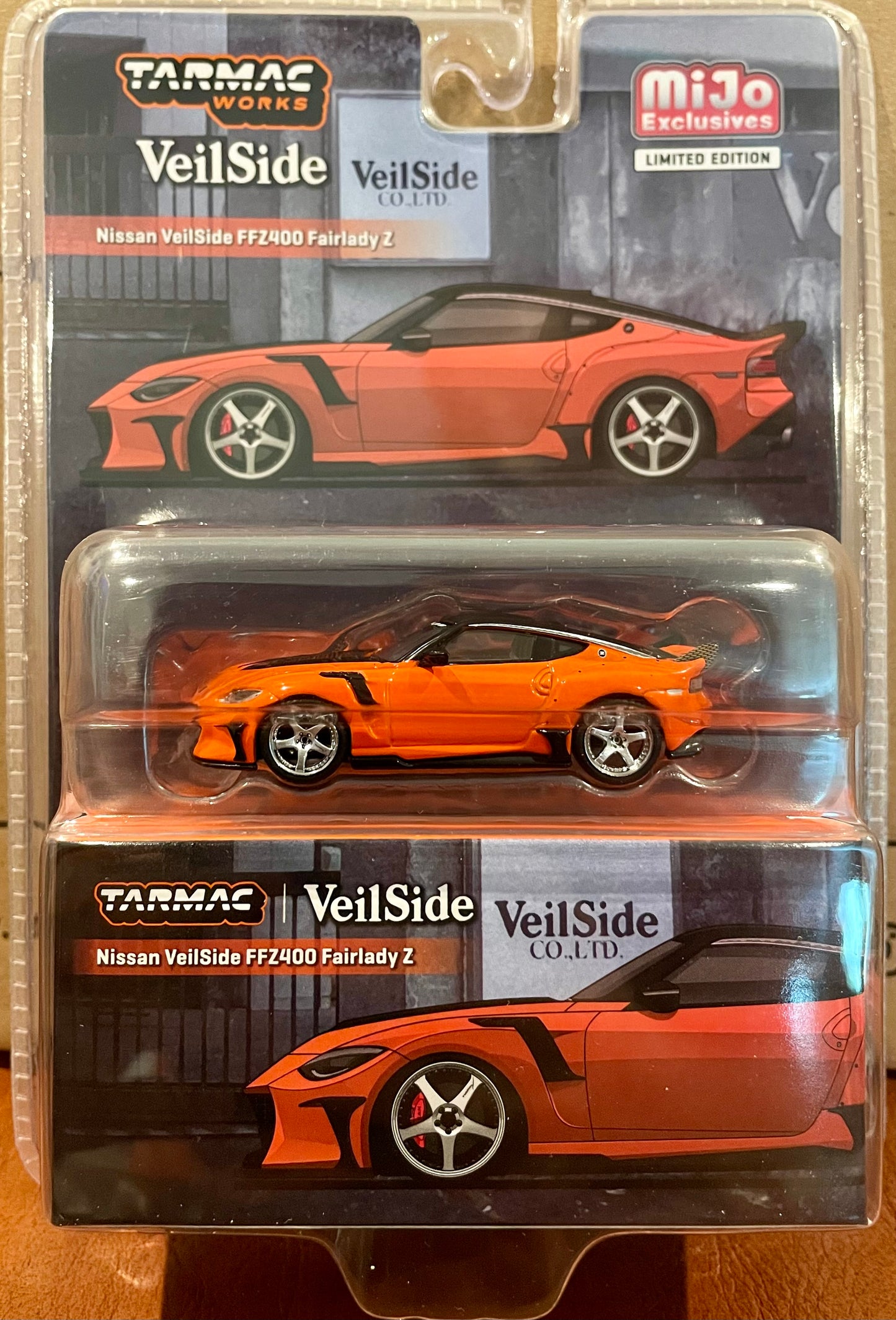Tarmac Works 1:64 Nissan VeilSide FFZ400 Fairlady Z – Orange – Global64 MiJo Exclusives Limited Edition