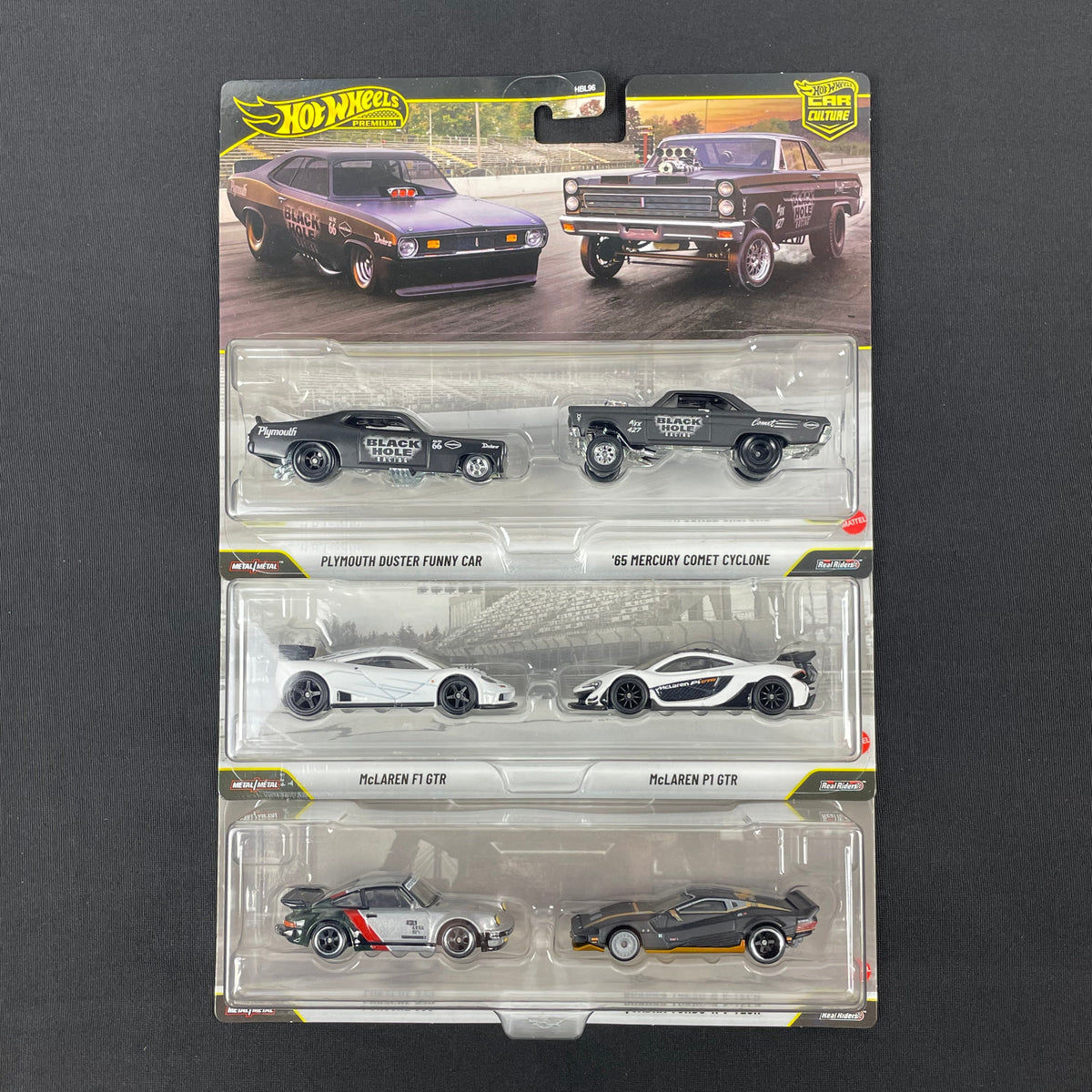 Hot Wheels 1:64 2-Pack Porsche, McLaren, Plymouth, and Mercury